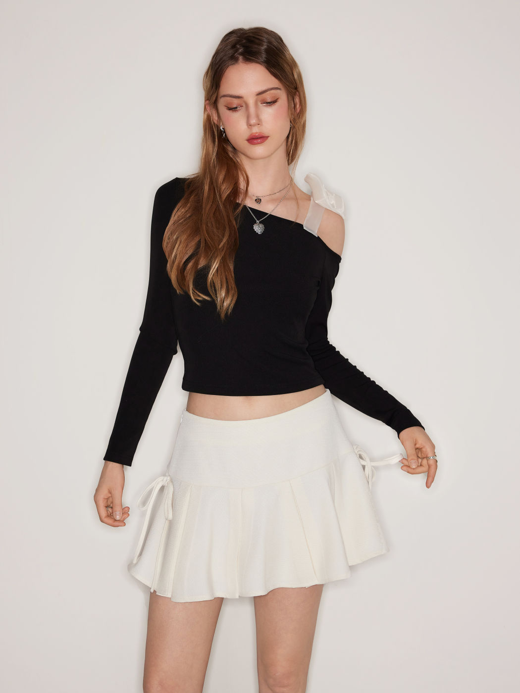 Mid Rise Pleated Bowknot Mini Skirt