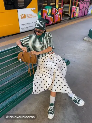 Maxi gonna a mezza vita con volant e tasca a pois